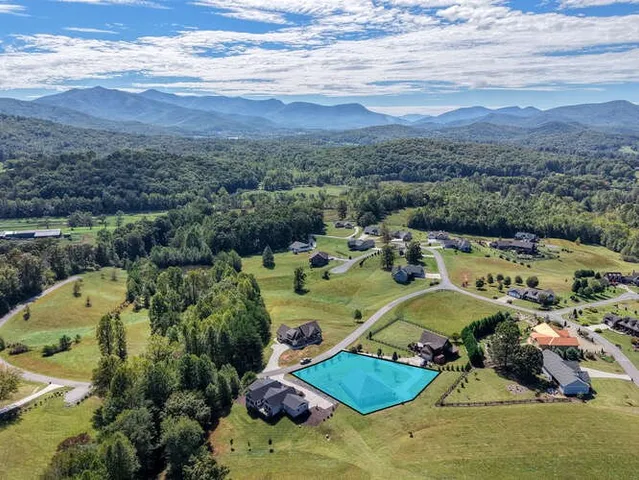 a view of a lake with a mountain