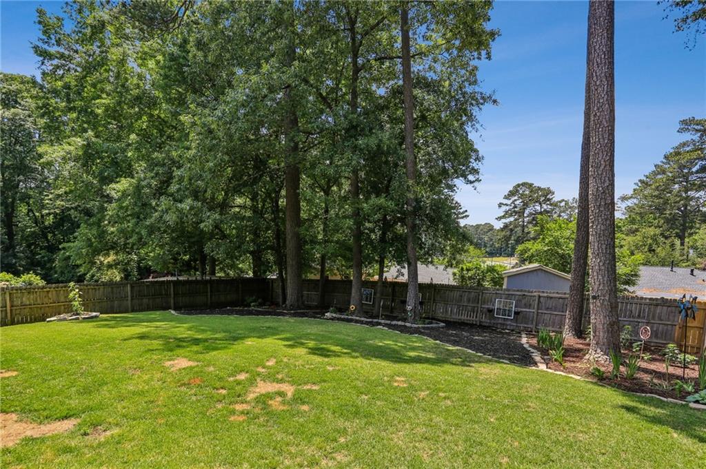2740 Frontier Trail Atlanta, GA 30341 - Photo 9 of 29 a view of a backyard with a small cabin
