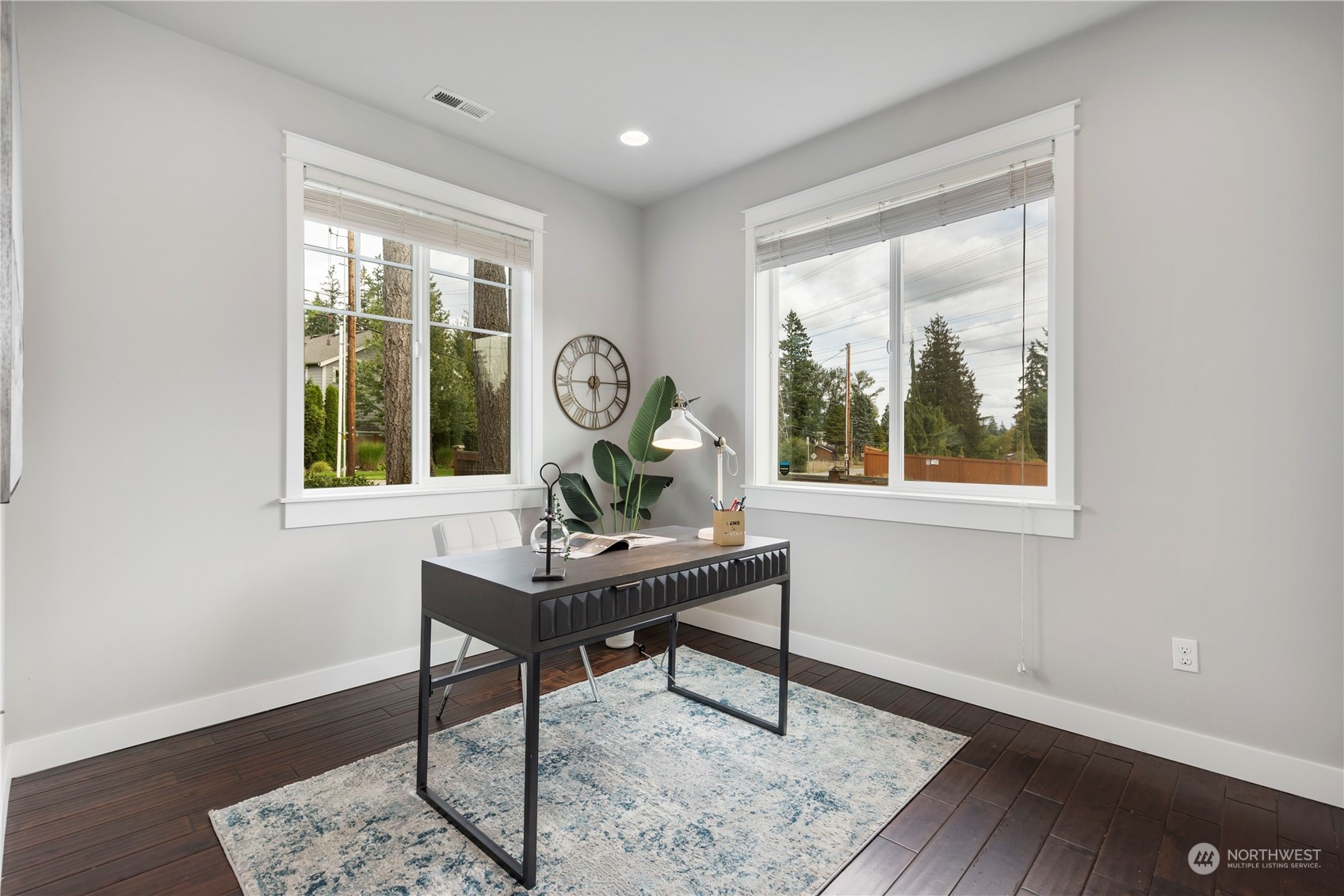 19730 Filbert Drive Bothell, WA 98012 - Photo 17 of 35 a view of a workspace with wooden floor and a window