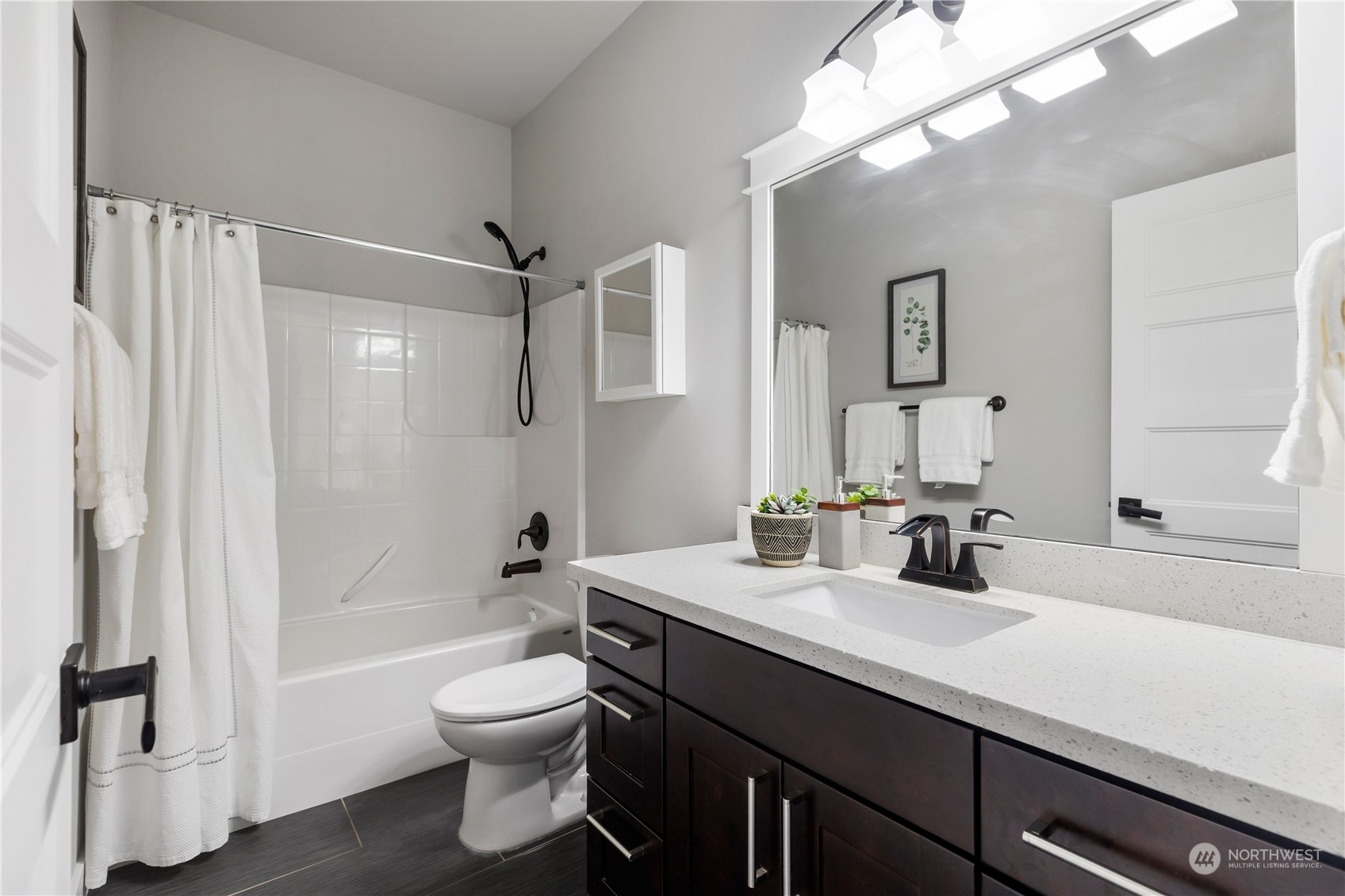 19730 Filbert Drive Bothell, WA 98012 - Photo 18 of 35 a bathroom with a sink a toilet and shower