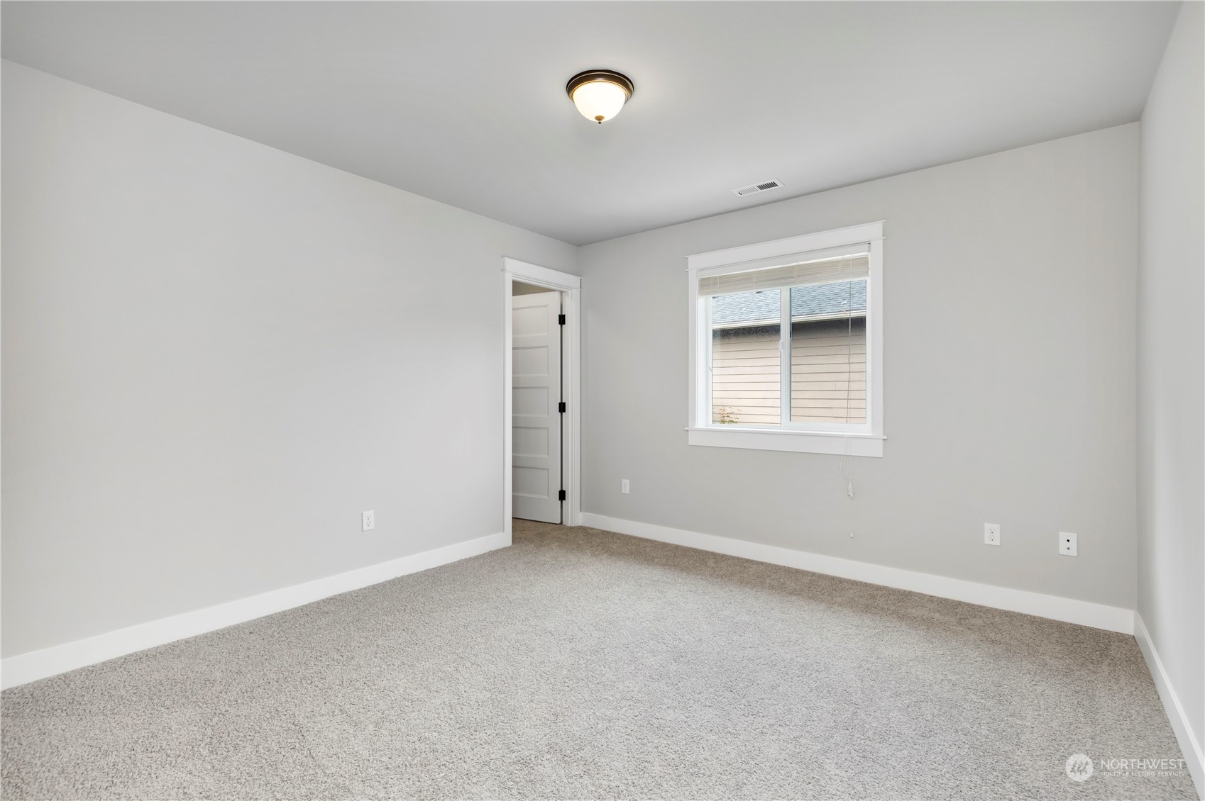 19730 Filbert Drive Bothell, WA 98012 - Photo 23 of 35 a view of an empty room with a window
