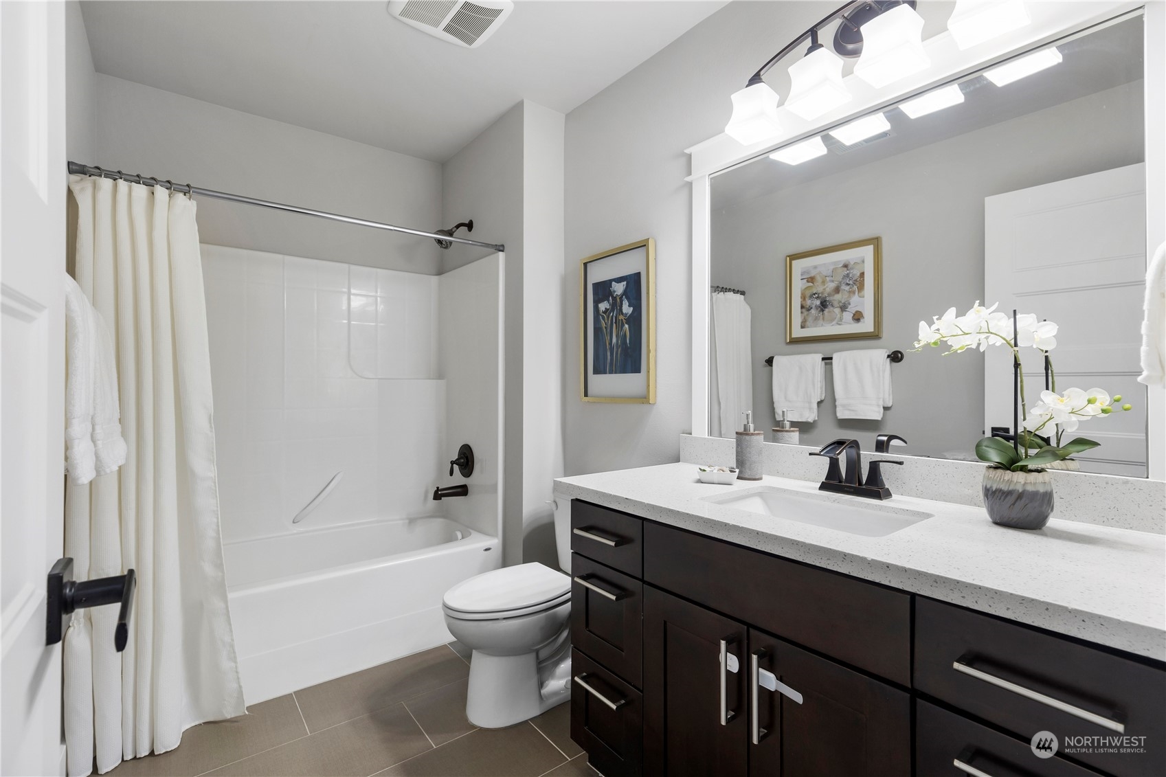 19730 Filbert Drive Bothell, WA 98012 - Photo 24 of 35 a bathroom with a double vanity sink toilet mirror and shower