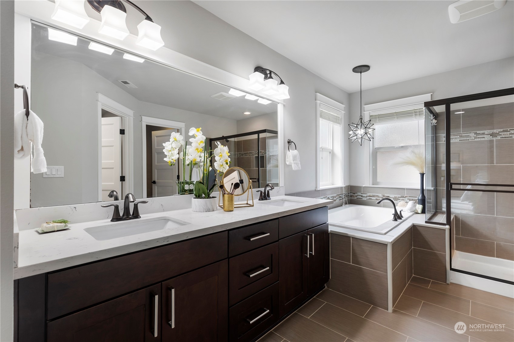 19730 Filbert Drive Bothell, WA 98012 - Photo 28 of 35 a bathroom with a double vanity sink mirror and double
