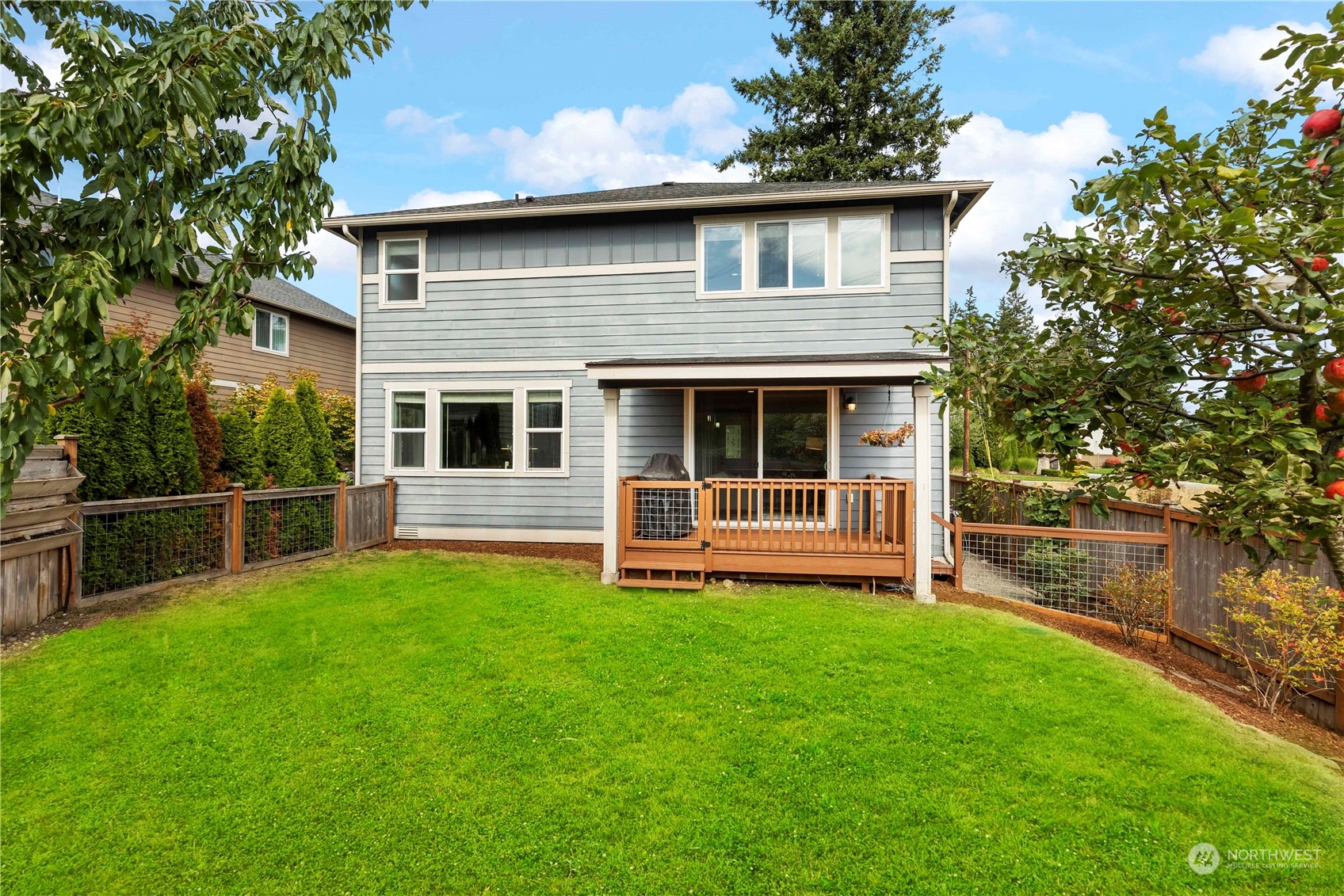 19730 Filbert Drive Bothell, WA 98012 - Photo 33 of 35 a house that has a big yard with wooden fence