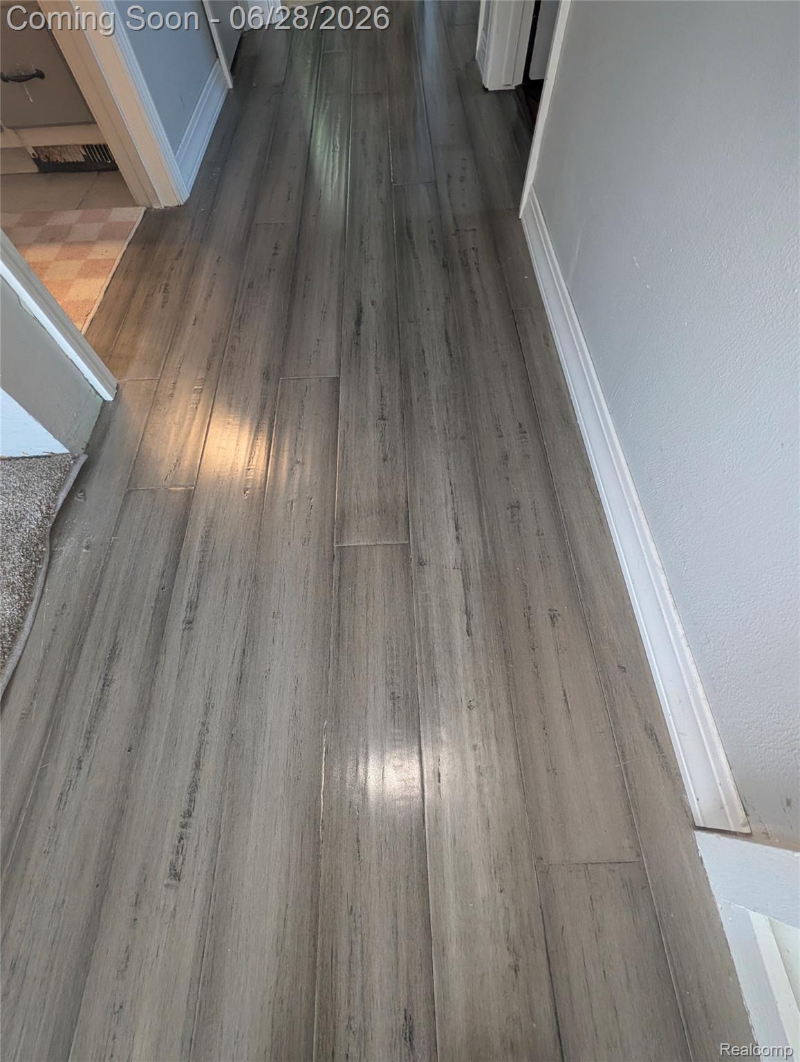 4456 East Coldwater Road Flint, MI 48506 - Photo 16 of 35 Wood-finish flooring throughout the hallway