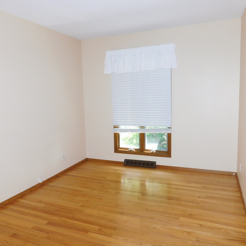 10471 Lee Road Waterman, IL 60556 - Photo 16 of 20 a view of an empty room with a window and a fireplace
