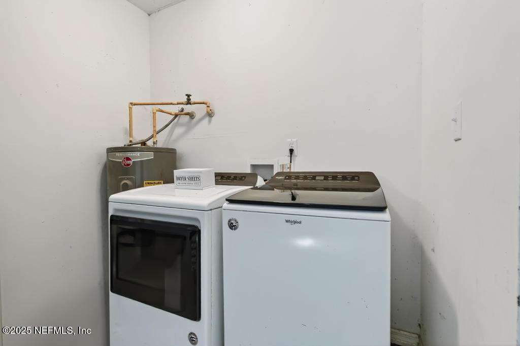 17080 Mcintosh Road Hilliard, FL 32046 - Photo 22 of 52 a utility room with dryer and washer