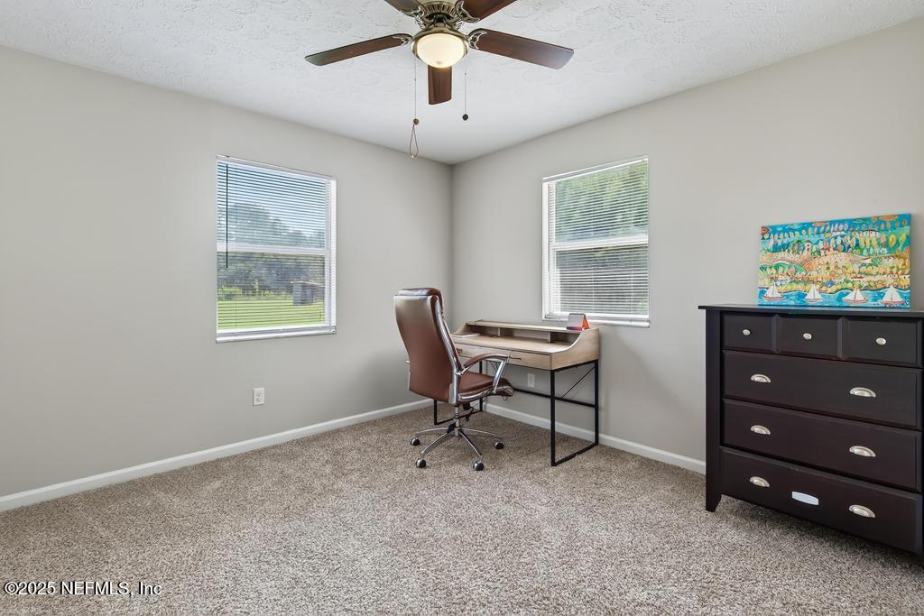 17080 Mcintosh Road Hilliard, FL 32046 - Photo 23 of 52 a workspace with a window