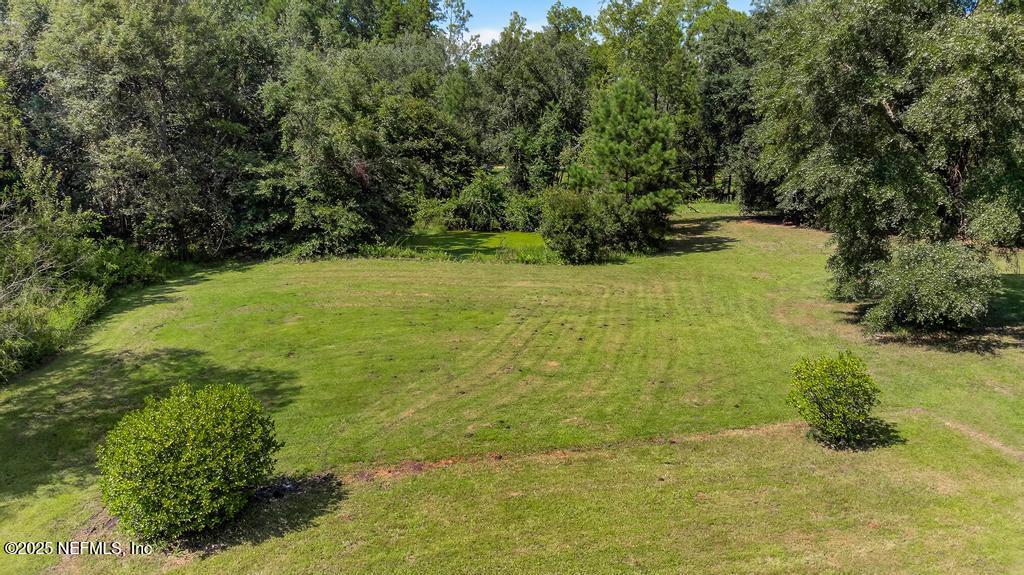 17080 Mcintosh Road Hilliard, FL 32046 - Photo 41 of 52 a view of yard with green space