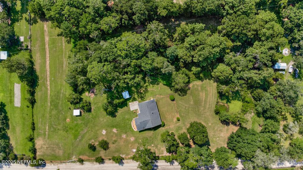 17080 Mcintosh Road Hilliard, FL 32046 - Photo 50 of 52 an aerial view of residential house with outdoor space and trees all around