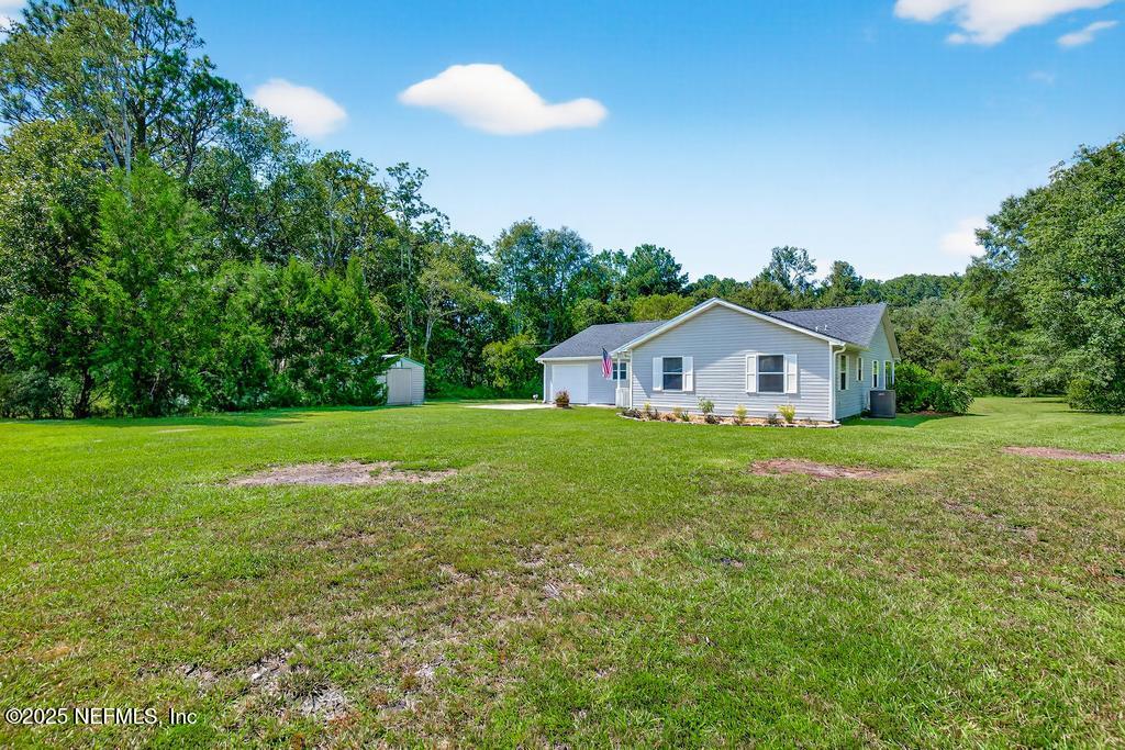 17080 Mcintosh Road Hilliard, FL 32046 - Photo 52 of 52 a house view with garden space