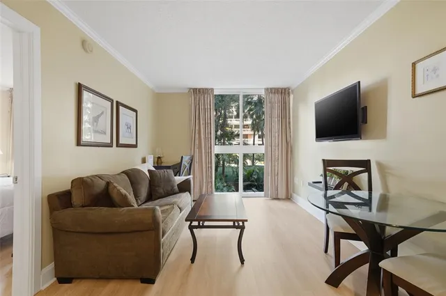 a view of a balcony with chair and table