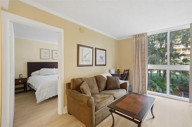 a view of a balcony with chairs and a table