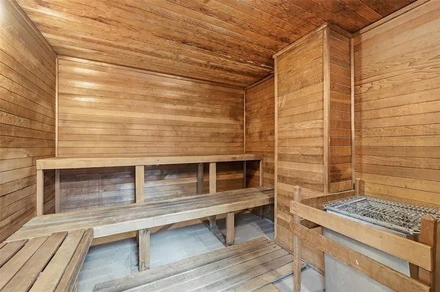 a view of a backyard with swimming pool