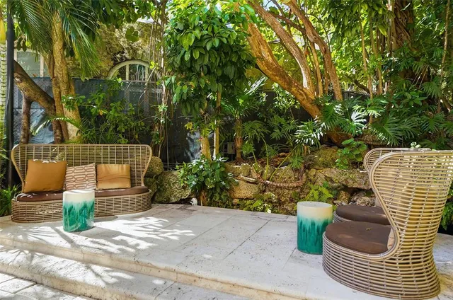 a wooden bench with some plants