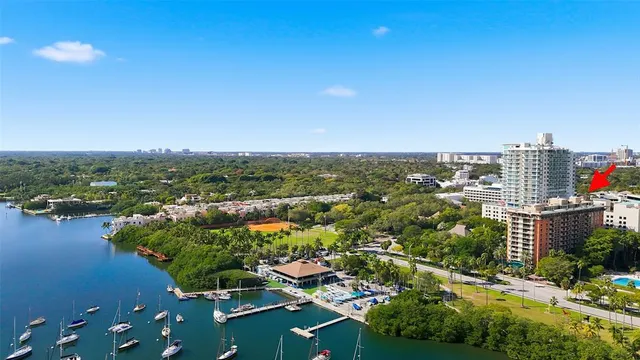 an aerial view of a house with a lake view