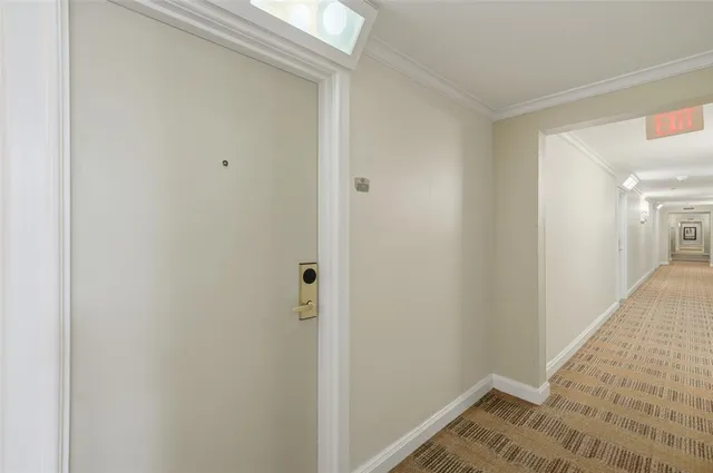 a kitchen with granite countertop a refrigerator stove and sink