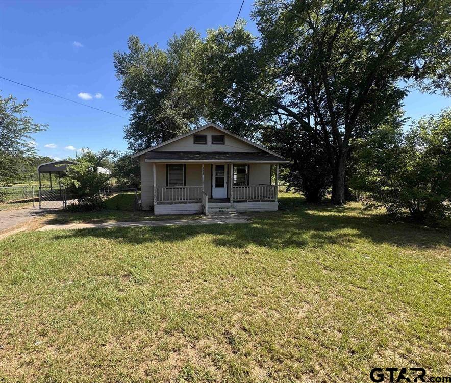 582 East Main Street Van, TX 75790 - Photo 1 of 12 a front view of a house with swimming pool