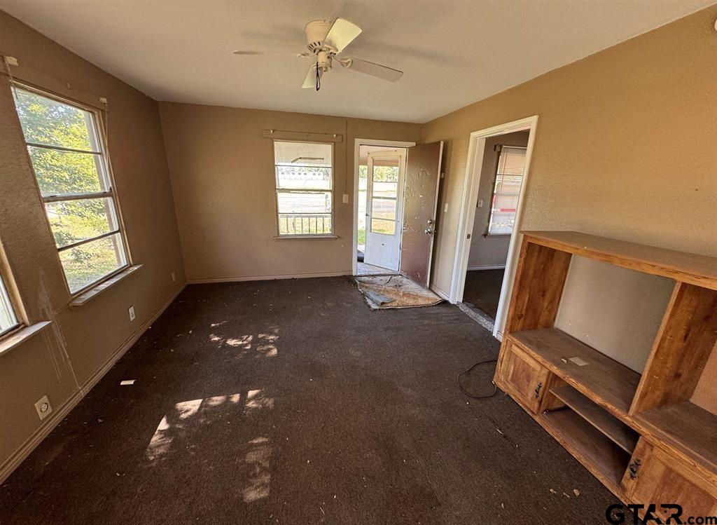 582 East Main Street Van, TX 75790 - Photo 7 of 12 a view of an empty room with a window