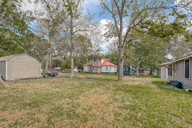 a house with trees in front of it
