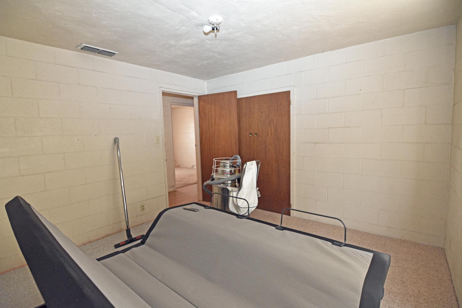 1206 South Verduga Road Turlock, CA 95380 - Photo 18 of 36 a view of a room with gym equipment