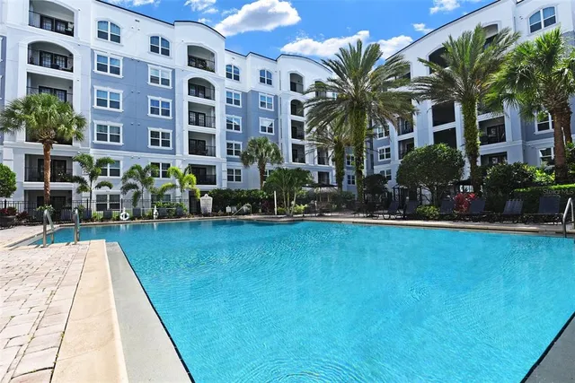 a kitchen with granite countertop a sink and a stove