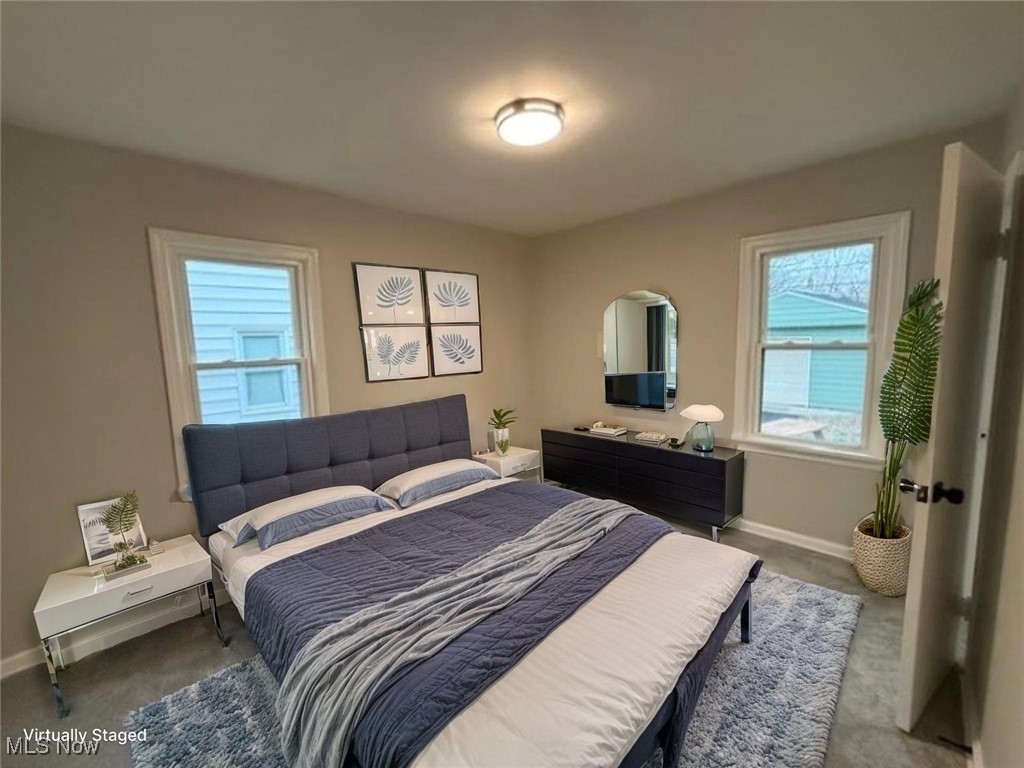 4658 Burleigh Road Cleveland, OH 44125 - Photo 14 of 24 Bedroom featuring baseboards and carpet