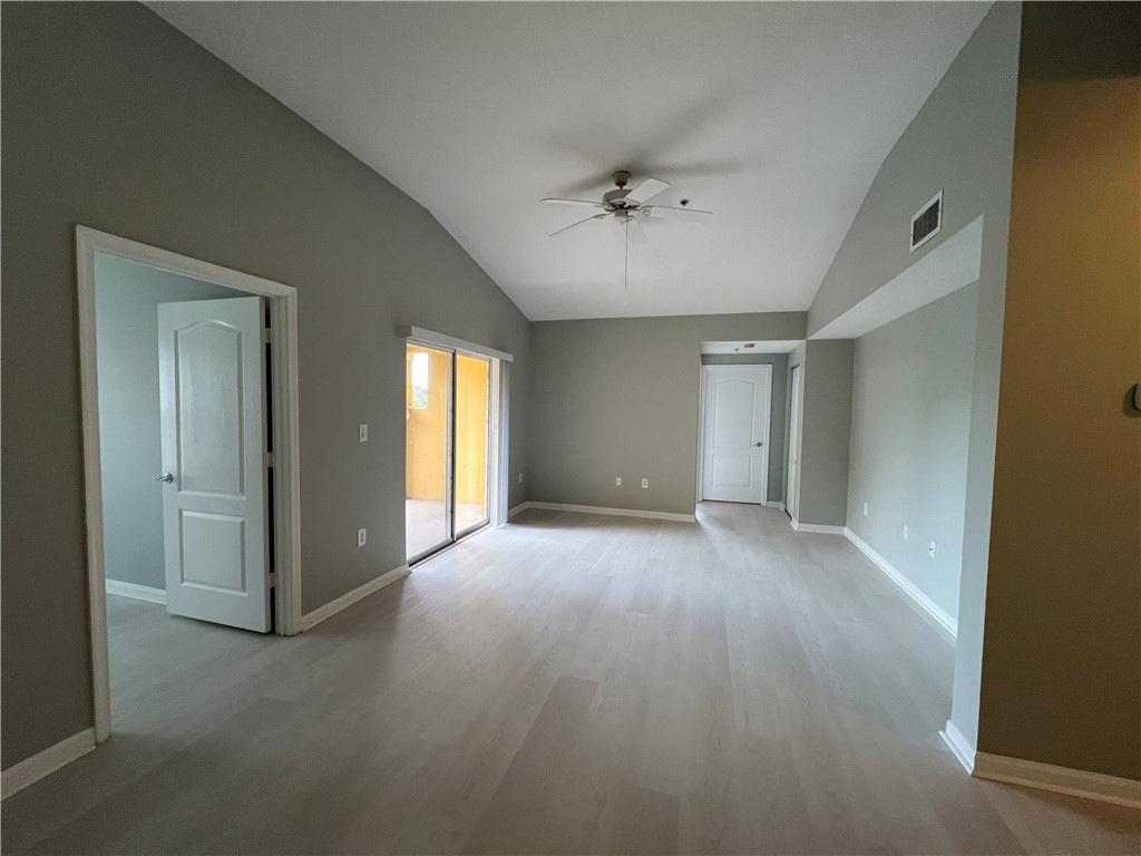 5090 Fairways Circle, Unit H308 Vero Beach, FL 32967 - Photo 7 of 19 a view of an empty room with a window