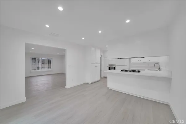 a view of workspace with wooden floor