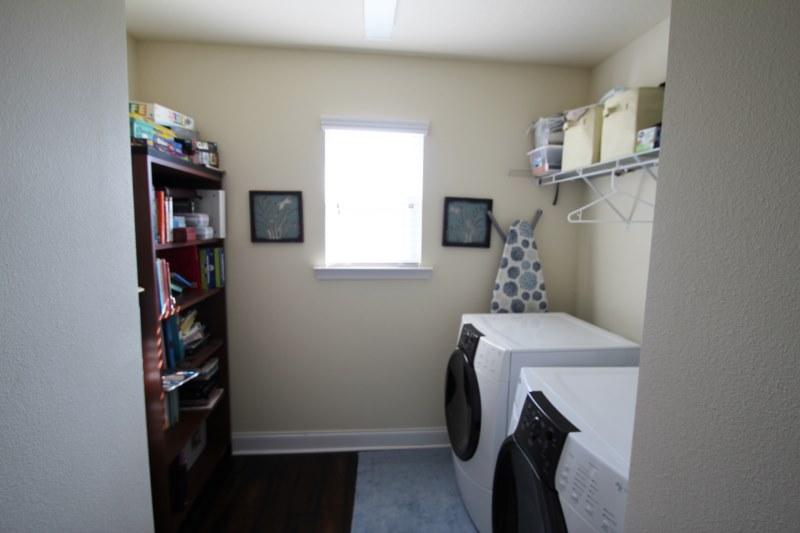 4556 Hermosa Road Crestview, FL 32539 - Photo 16 of 35 a view of storage and utility room with washer and dryer