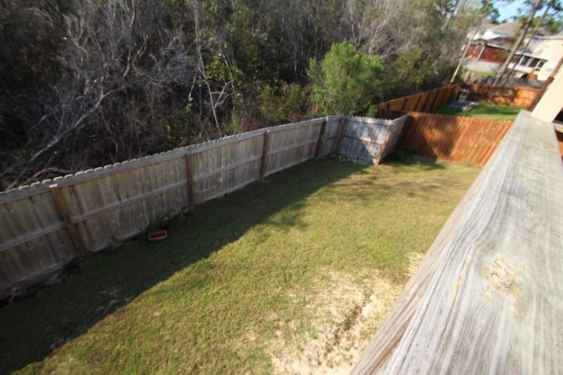 4556 Hermosa Road Crestview, FL 32539 - Photo 23 of 35 a view of balcony and yard