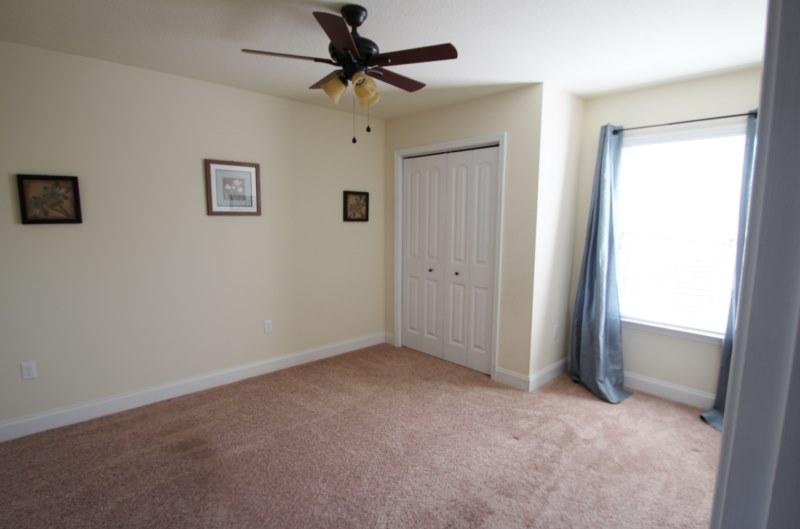 4556 Hermosa Road Crestview, FL 32539 - Photo 31 of 35 a view of room with window and ceiling fan