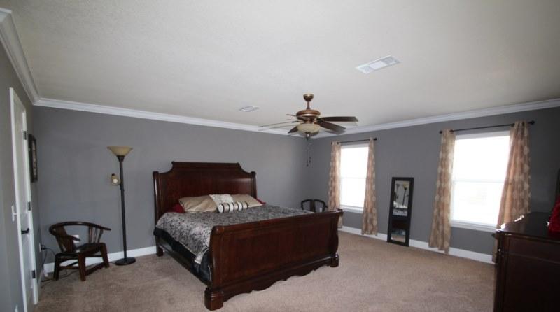4556 Hermosa Road Crestview, FL 32539 - Photo 6 of 35 a bedroom with a bed and window
