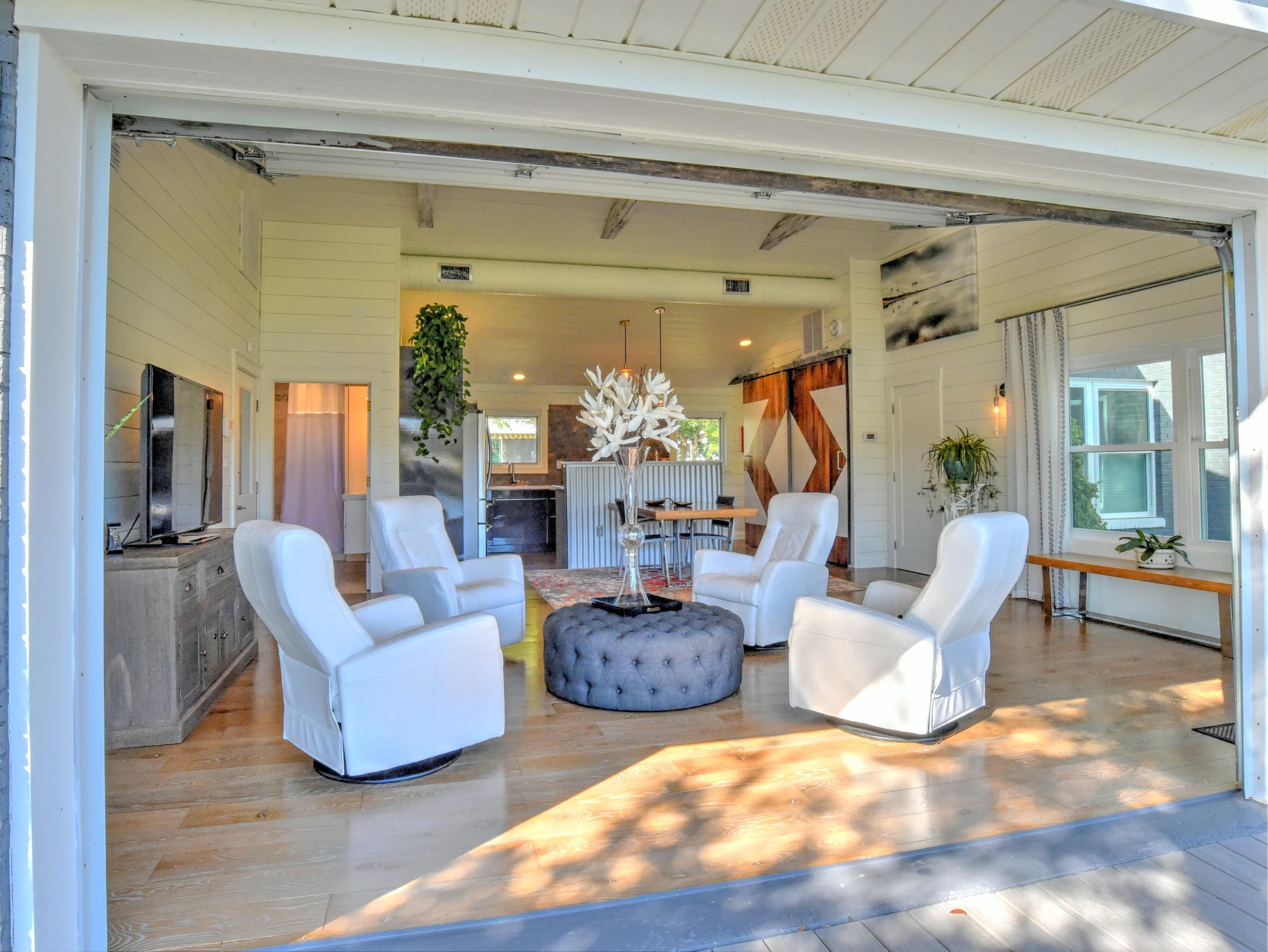 95 Bayou Road Santa Rosa Beach, FL 32459 - Photo 13 of 70 a living room with fireplace furniture and a chandelier