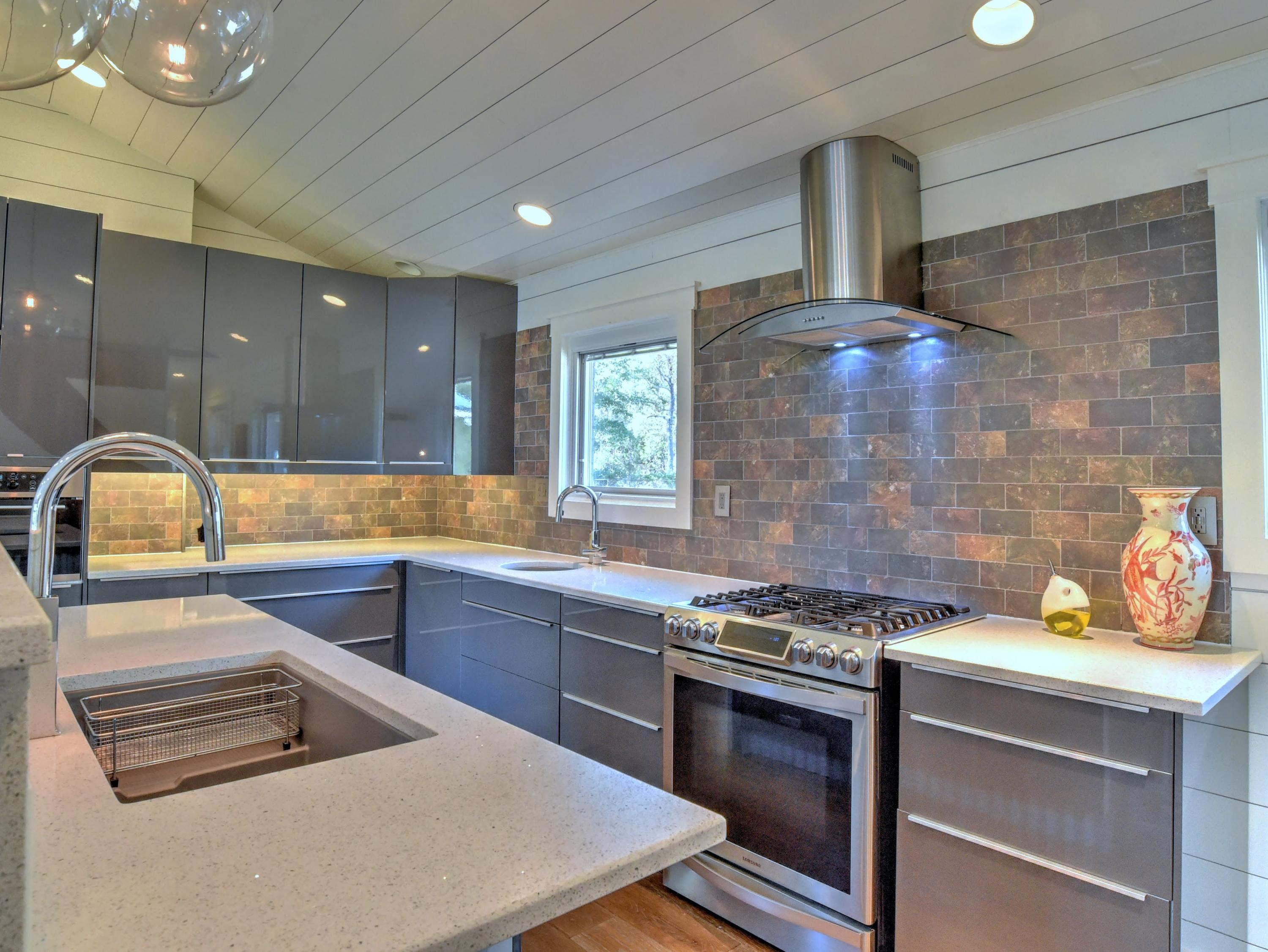 95 Bayou Road Santa Rosa Beach, FL 32459 - Photo 23 of 70 a kitchen with stainless steel appliances a stove and a sink