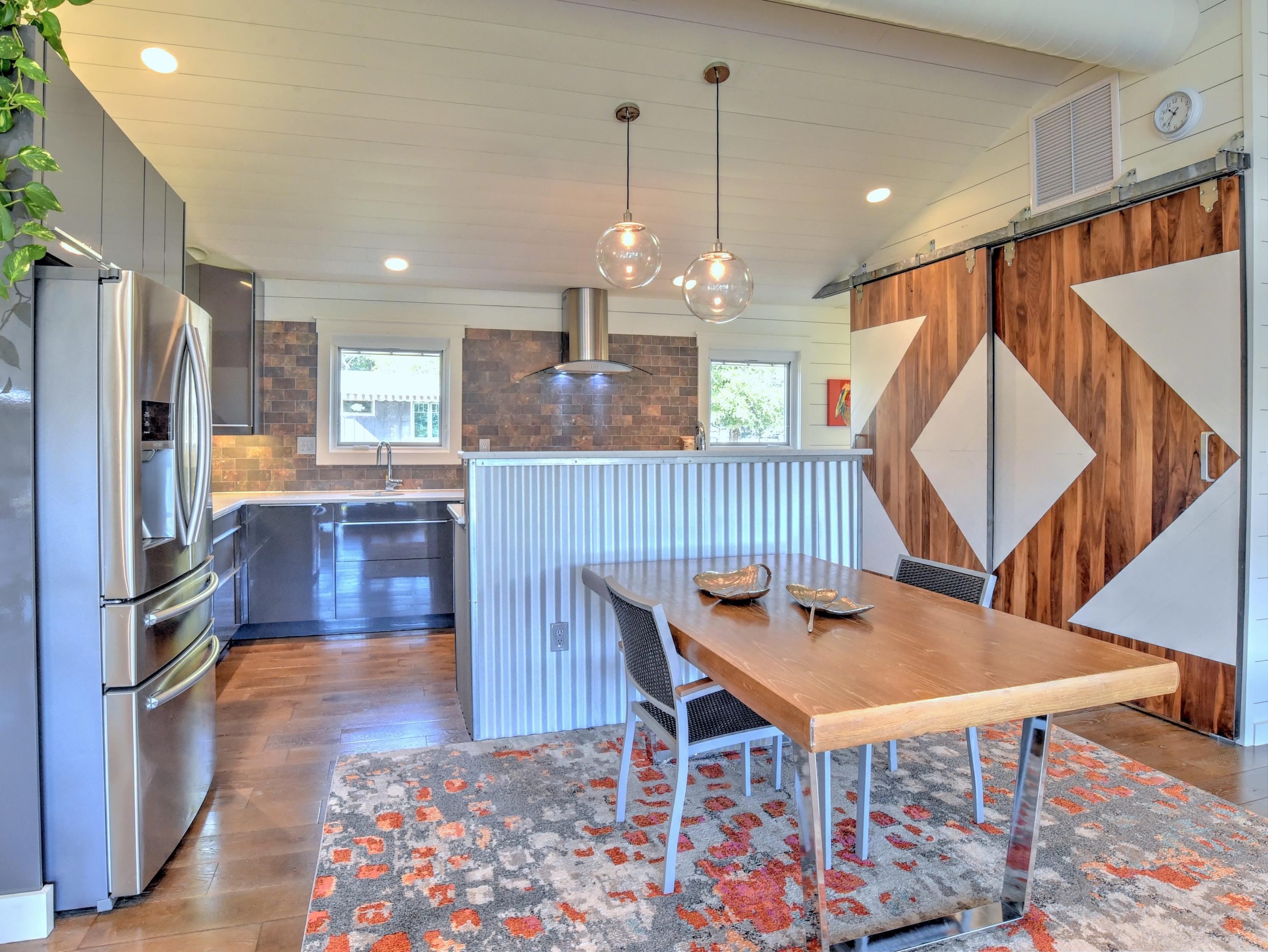 95 Bayou Road Santa Rosa Beach, FL 32459 - Photo 34 of 70 a view of a dining room with furniture window and wooden floor