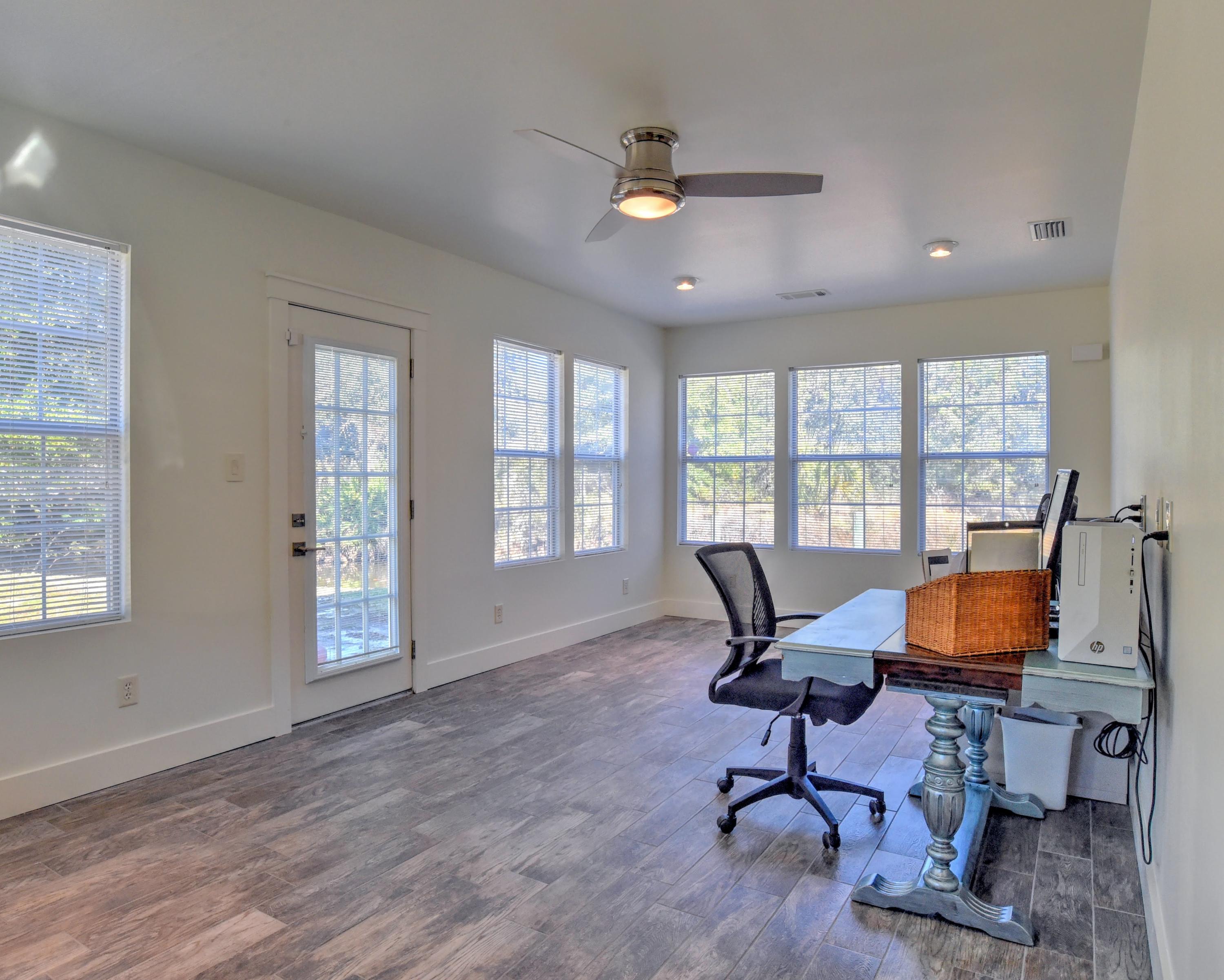 95 Bayou Road Santa Rosa Beach, FL 32459 - Photo 36 of 70 a view of a livingroom with workspace and a window