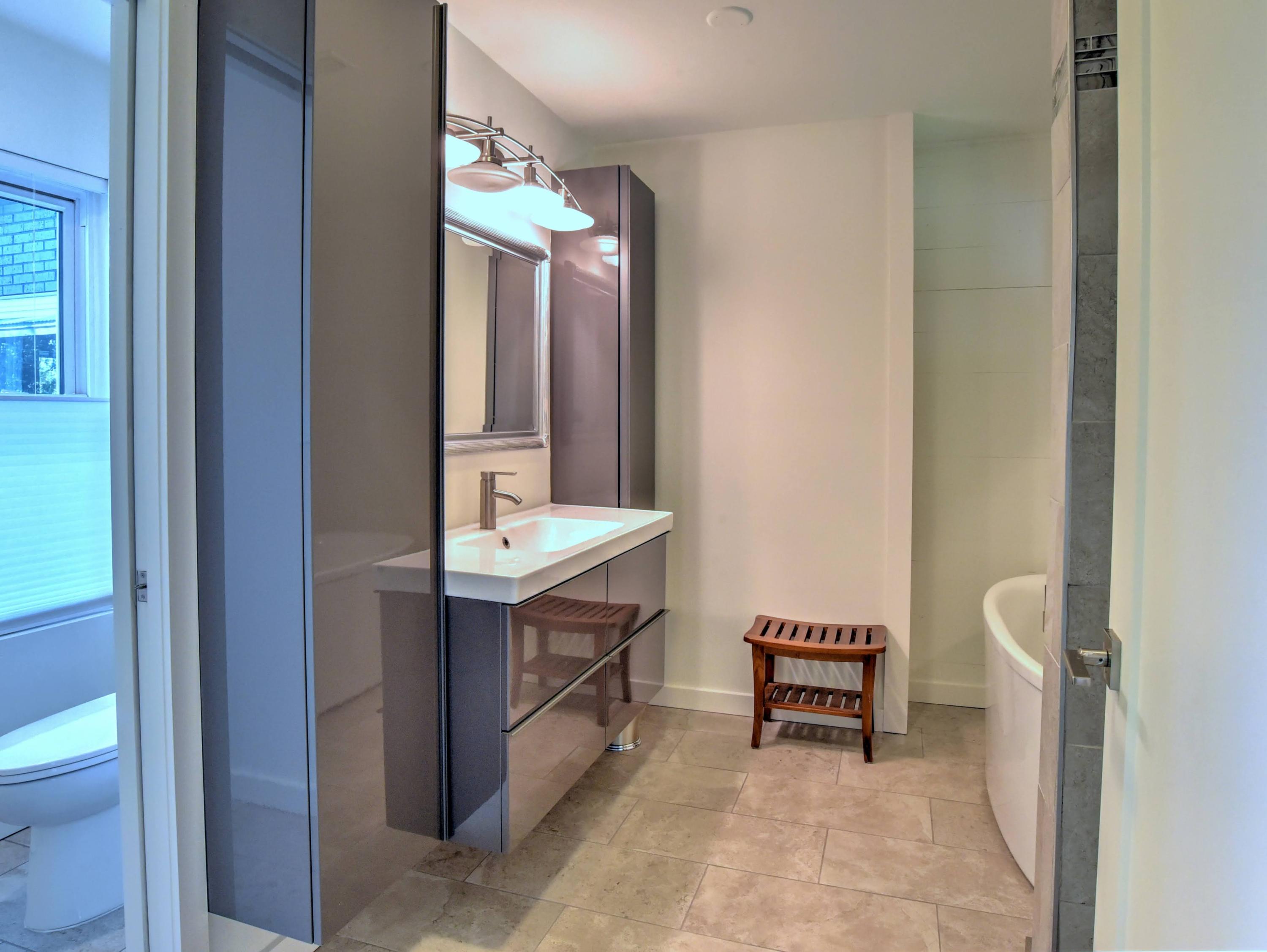 95 Bayou Road Santa Rosa Beach, FL 32459 - Photo 38 of 70 a bathroom with a sink and a mirror