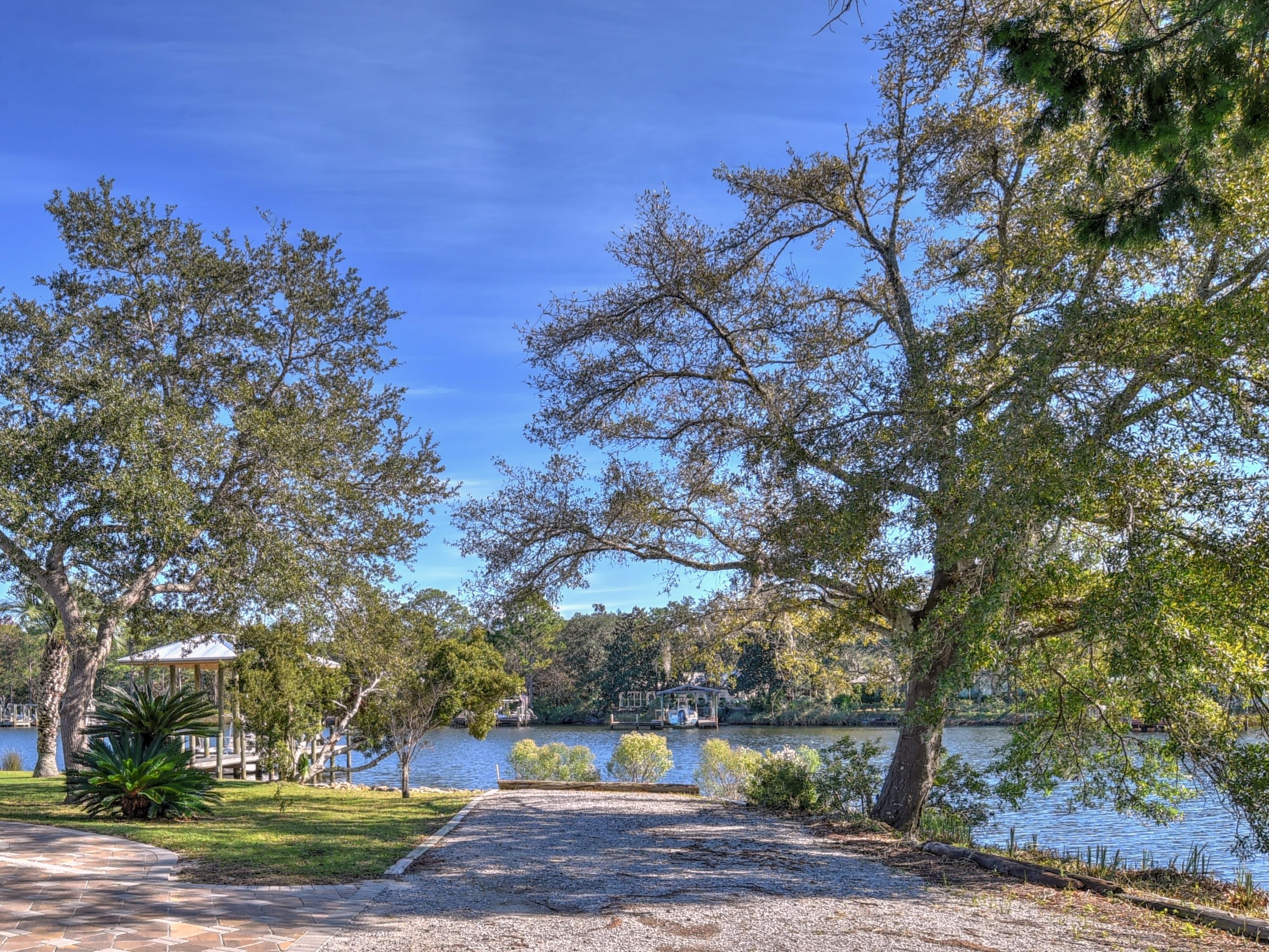 95 Bayou Road Santa Rosa Beach, FL 32459 - Photo 70 of 70 a view of a yard in front of the house