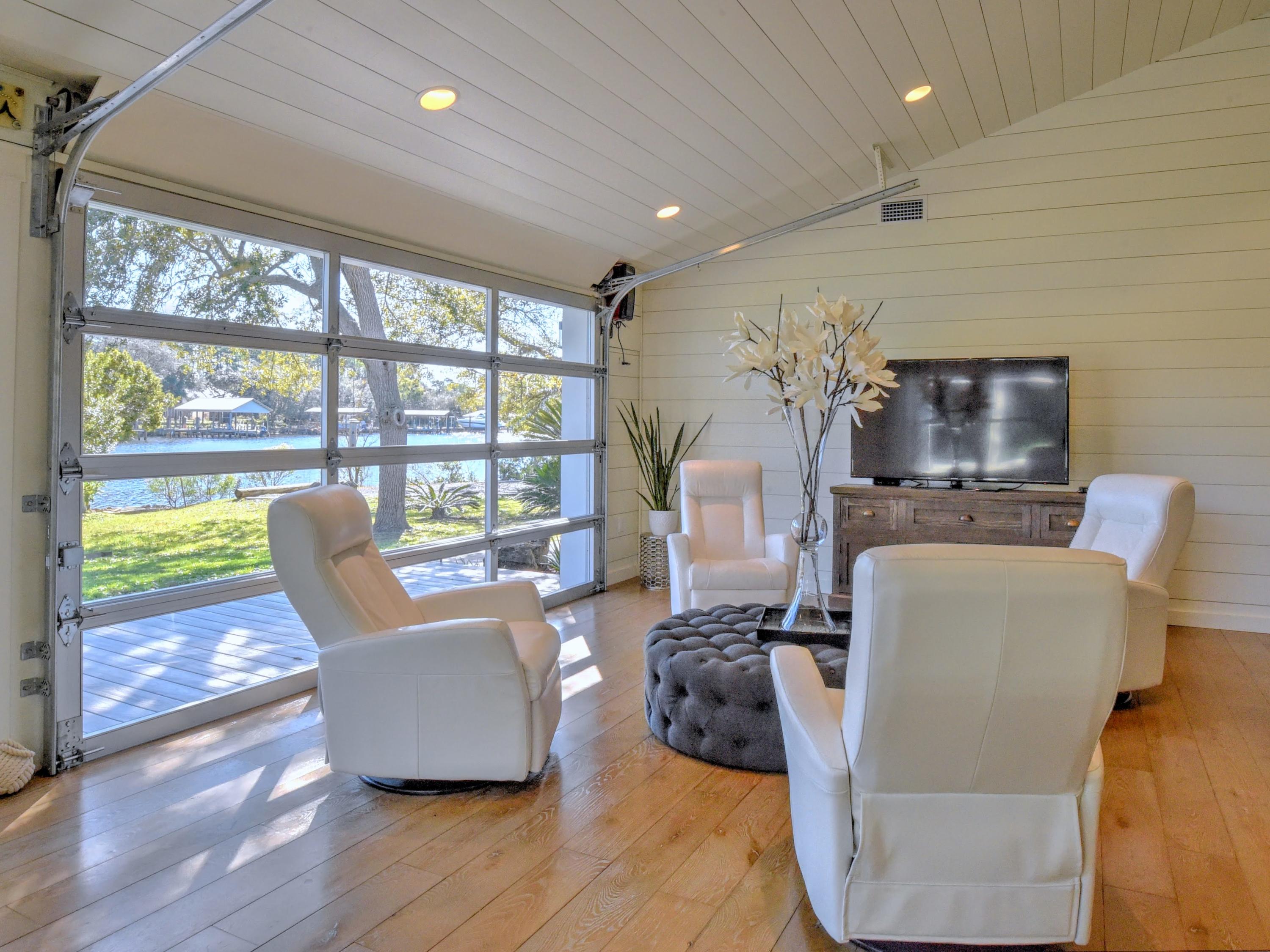 95 Bayou Road Santa Rosa Beach, FL 32459 - Photo 10 of 70 a living room with furniture and a large window
