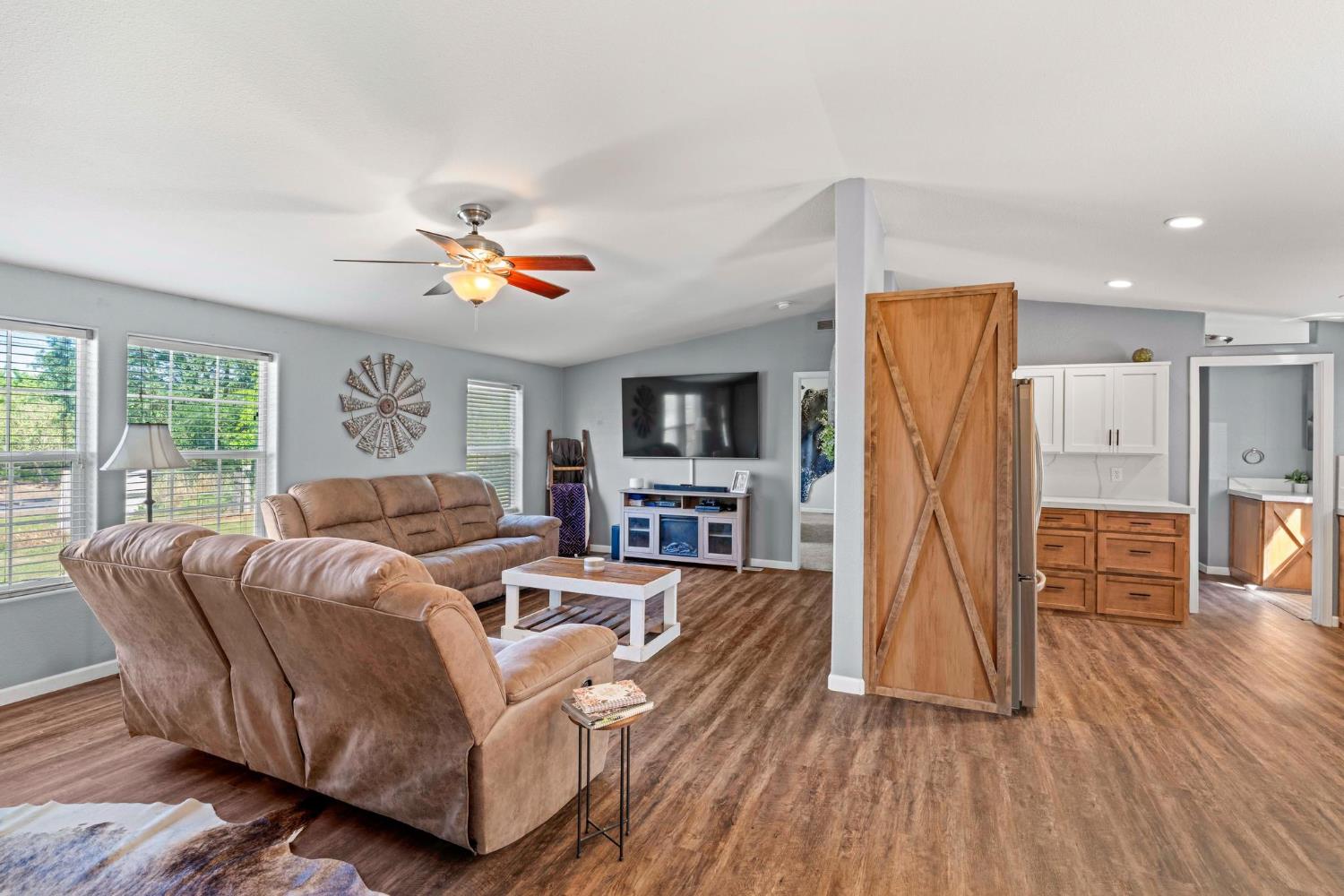 12518 Lone Oak Road Waterford, CA 95386 - Photo 12 of 50 a living room with furniture and a wooden floor