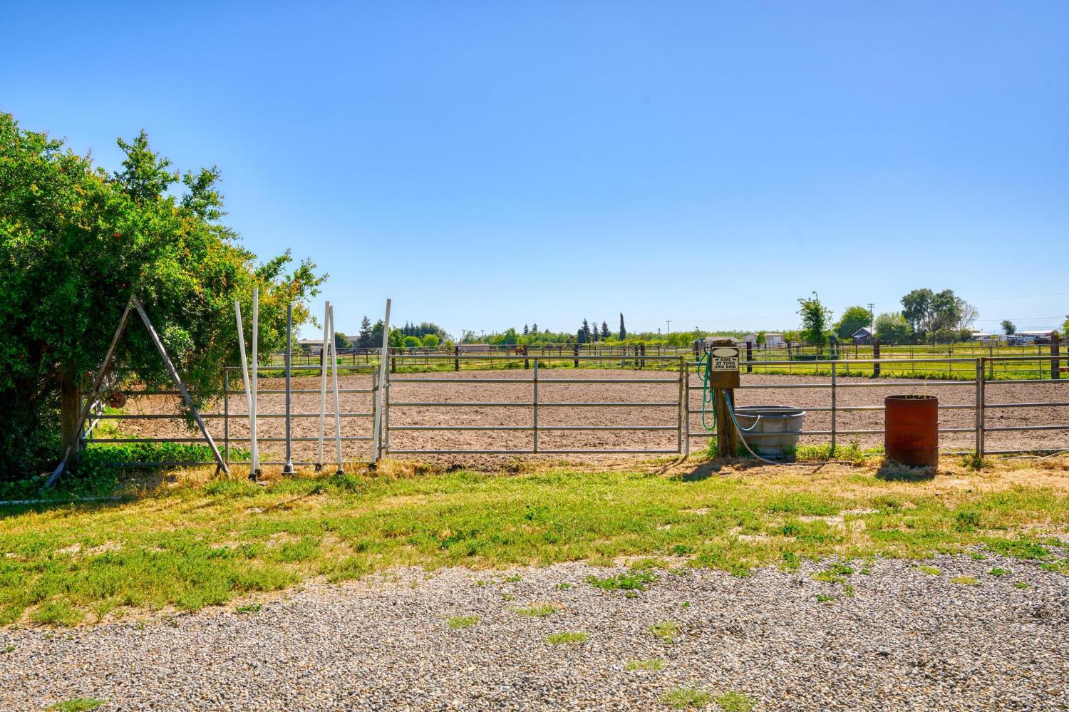 12518 Lone Oak Road Waterford, CA 95386 - Photo 36 of 50 a view of a lake with a big yard