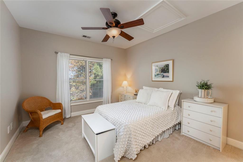 300 Tupelo Trail Canton, GA 30114 - Photo 26 of 50 a bedroom with a bed and a window
