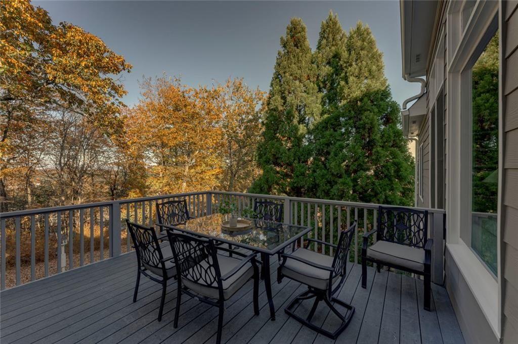 300 Tupelo Trail Canton, GA 30114 - Photo 41 of 50 a view of balcony with wooden floor and outdoor seating