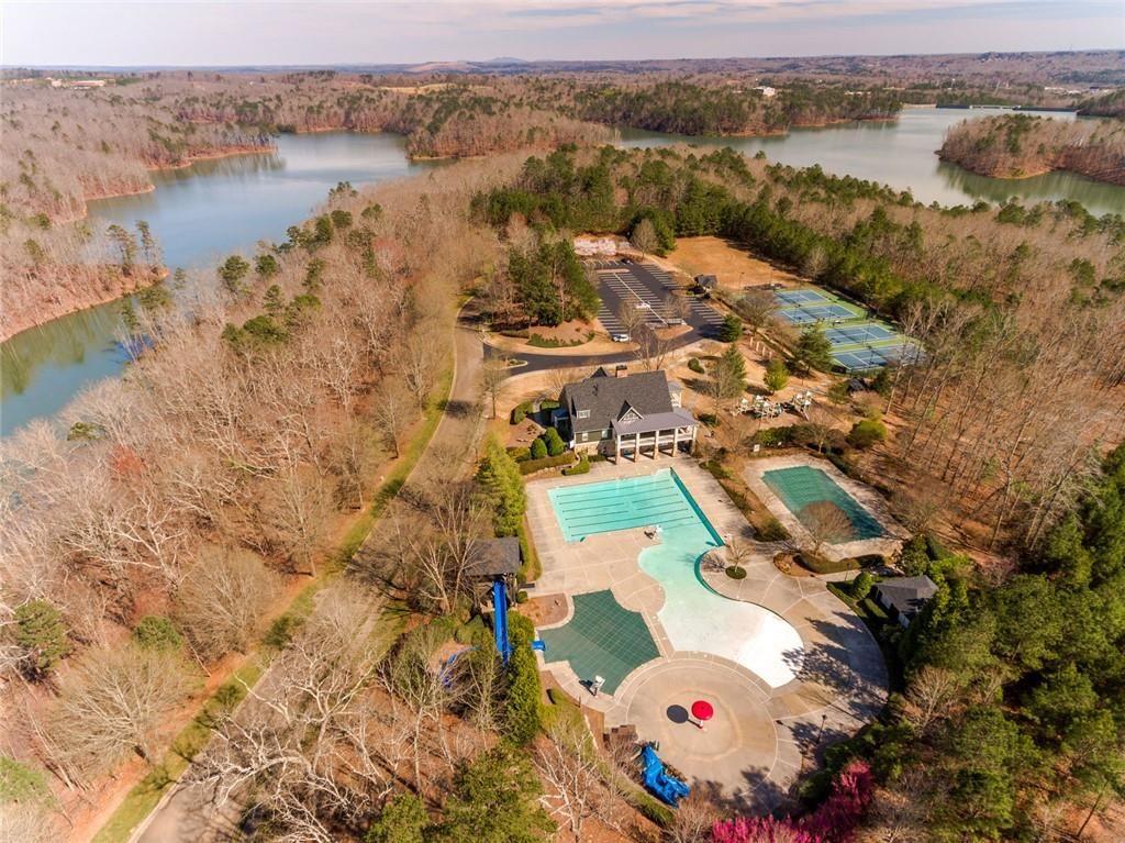 300 Tupelo Trail Canton, GA 30114 - Photo 43 of 50 an aerial view of lake and residential houses with outdoor space