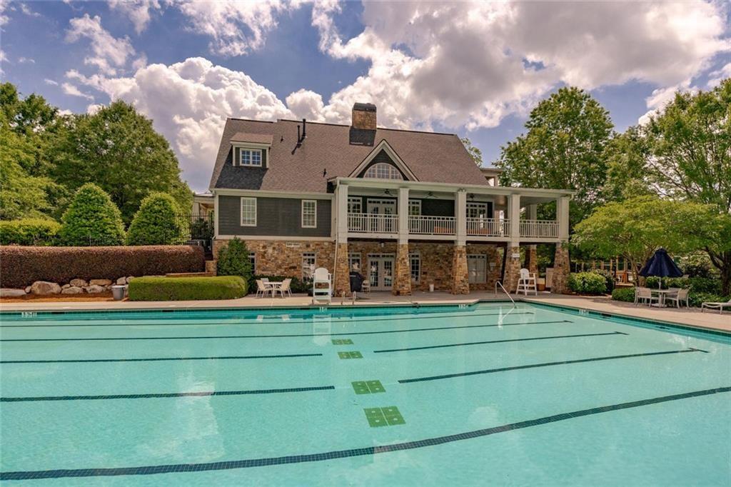 300 Tupelo Trail Canton, GA 30114 - Photo 45 of 50 a front view of a house with a garden