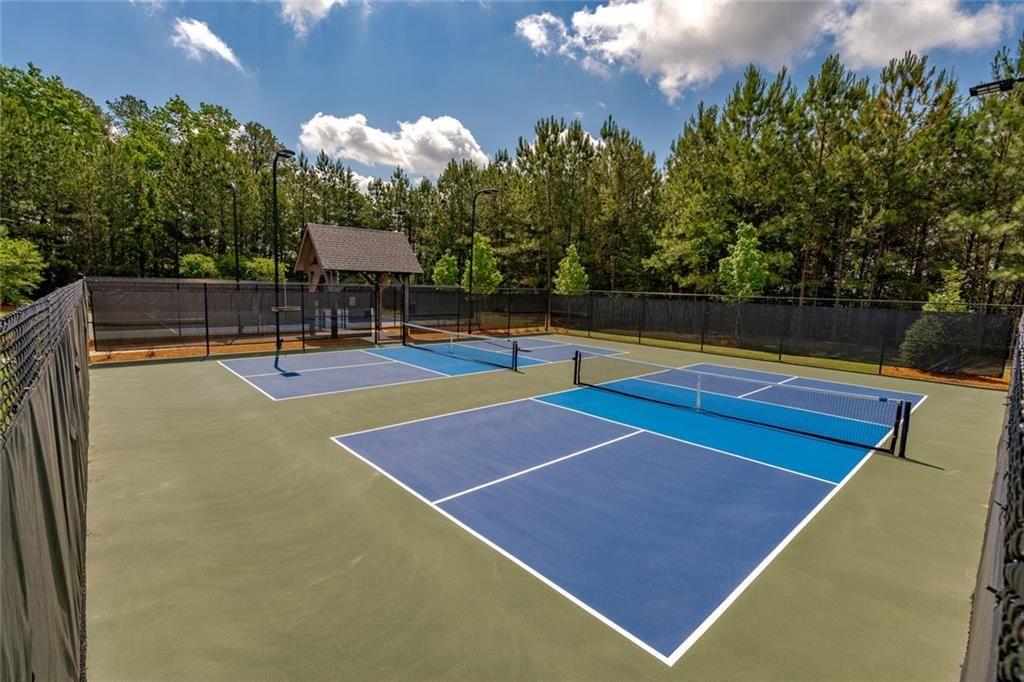 300 Tupelo Trail Canton, GA 30114 - Photo 49 of 50 a view of a tennis court
