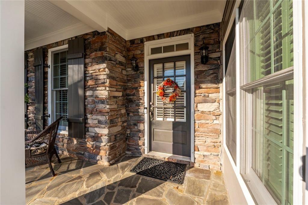 300 Tupelo Trail Canton, GA 30114 - Photo 5 of 50 front view of a house with a glass door