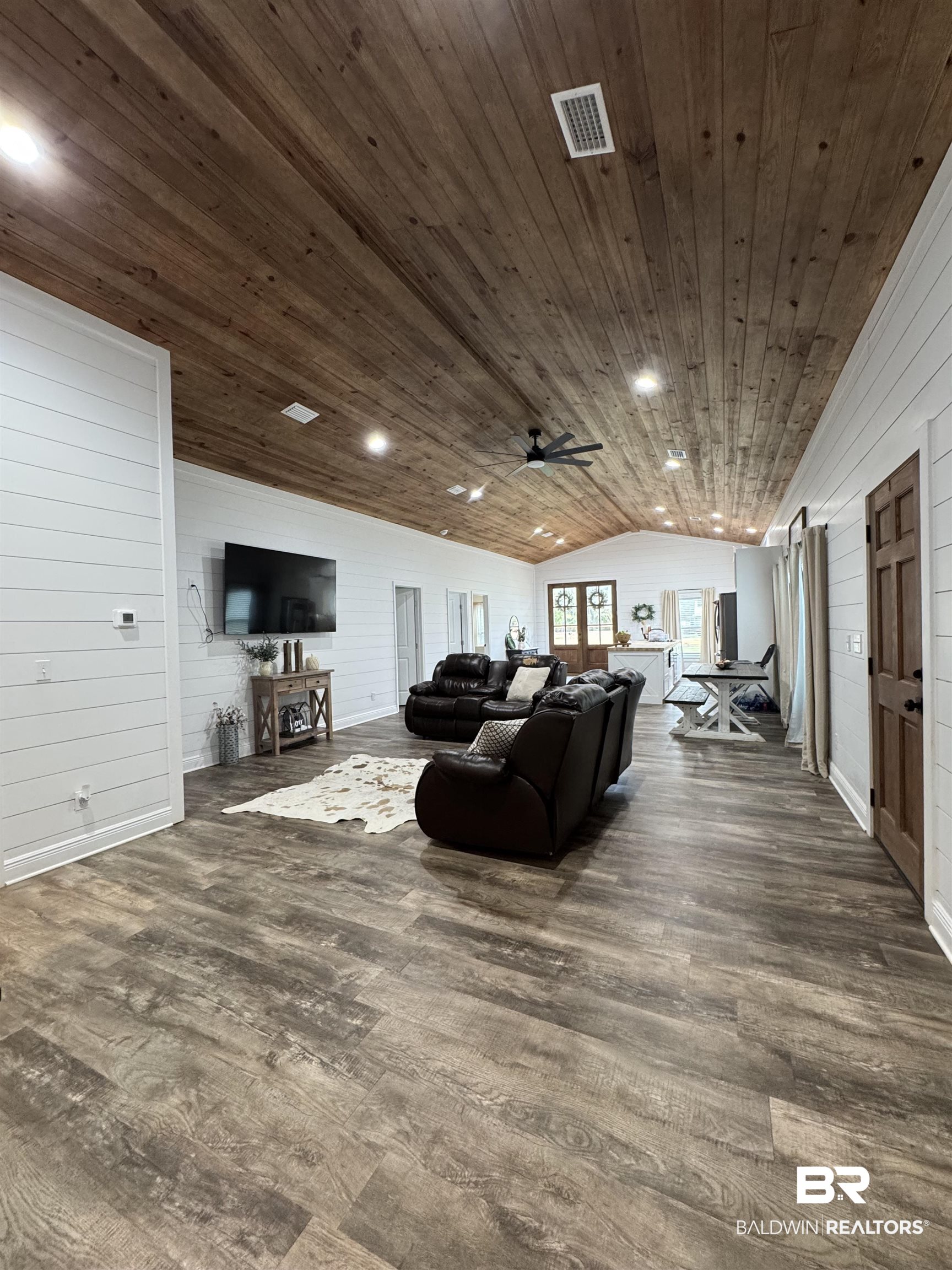 370 Dianne Road Frisco City, AL 36445 - Photo 29 of 41 Living room featuring dark hardwood / wood-style flooring, wood ceiling, ceiling fan, and vaulted ceiling