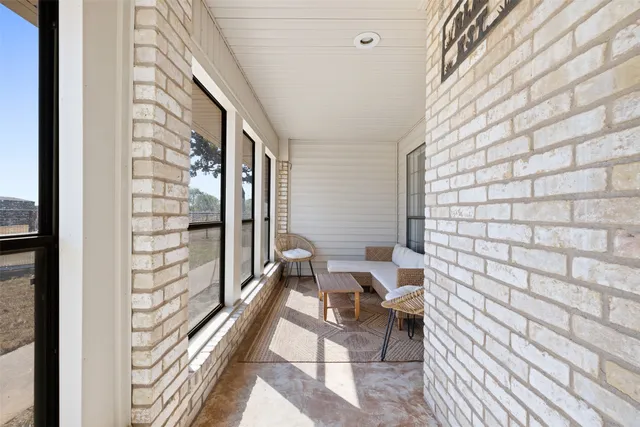 a utility room with cabinets washer and dryer